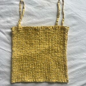 Brandy Melville Ally Top John Galt Light yellow smocked spaghetti strap crop top